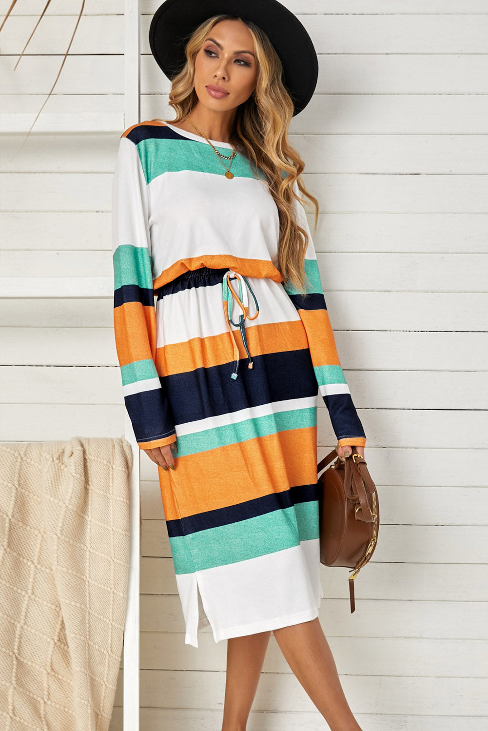 A stylish green multicolor block midi dress with a drawstring waist and long sleeves, perfect for fall fashion.