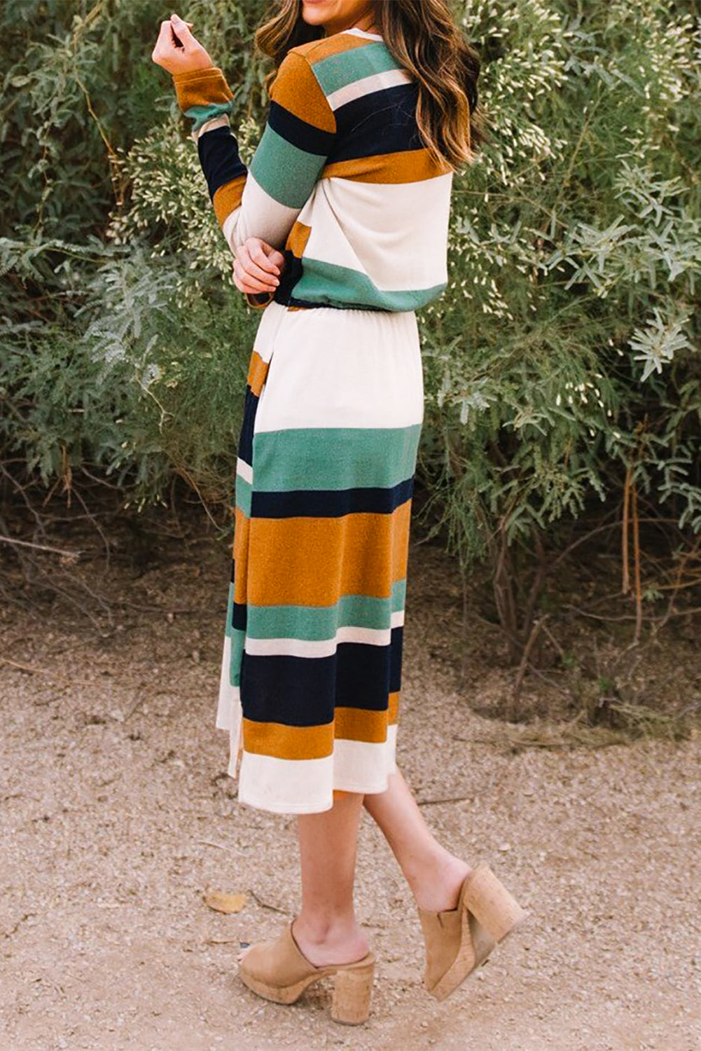A stylish green multicolor block midi dress with a drawstring waist and long sleeves, perfect for fall fashion.