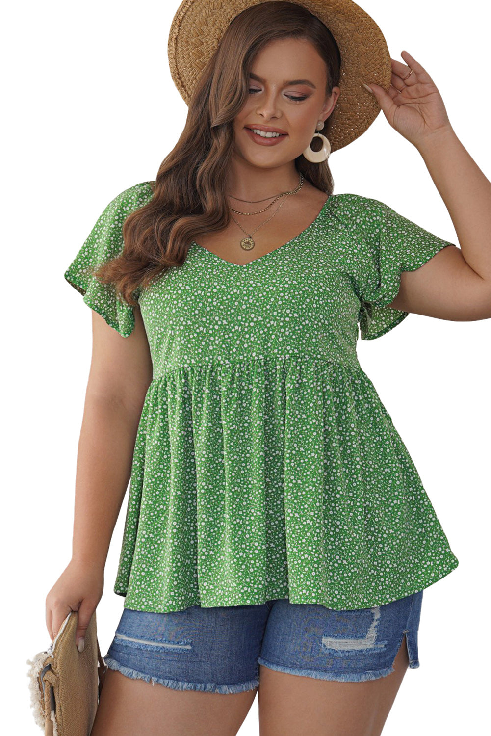 A stylish green plus size floral peplum top featuring a v-neck, flutter sleeves, and a flowy waist design, perfect for casual outings.