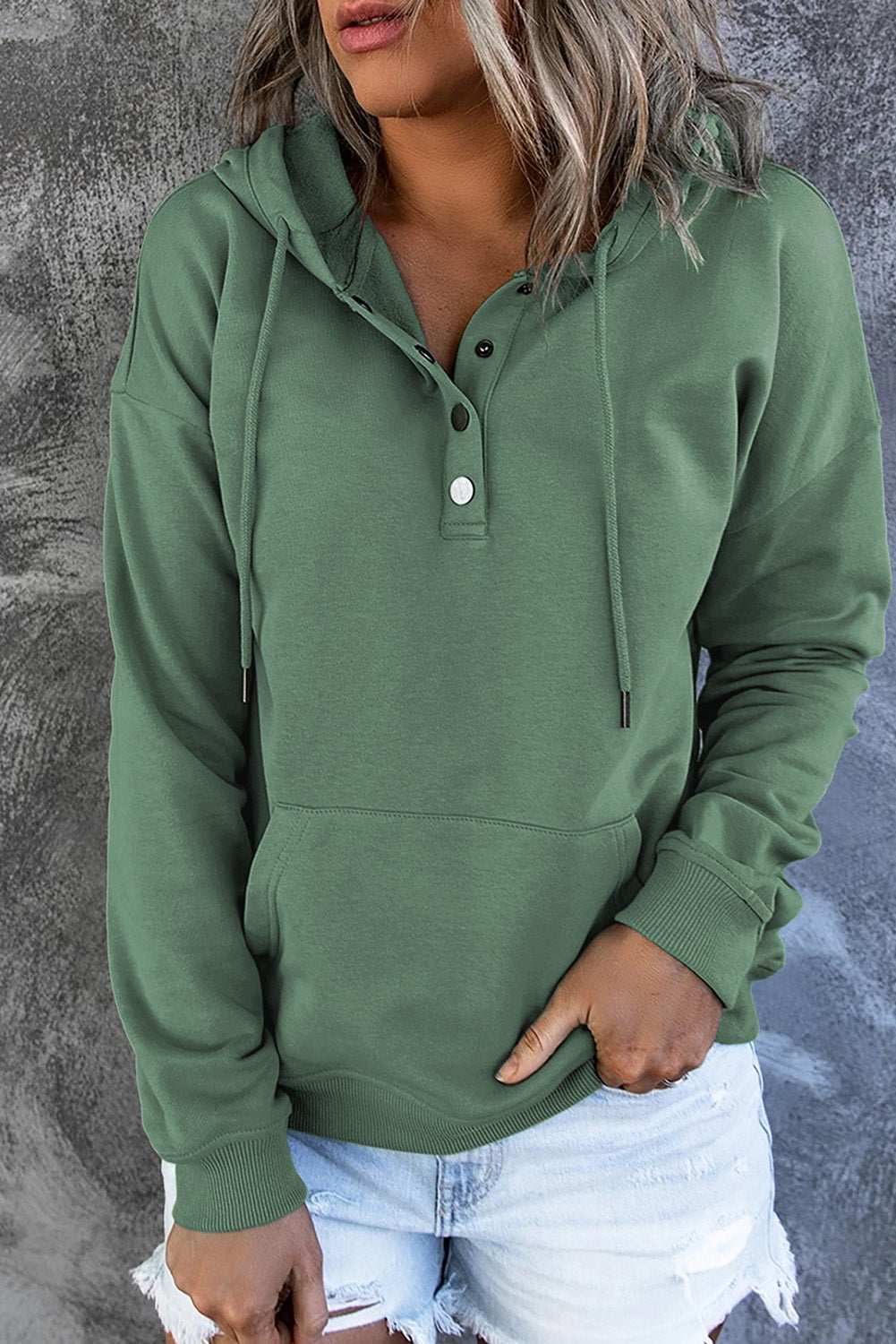Green Snap Button Pullover Hoodie featuring a kangaroo pocket and drawstring hood, perfect for casual wear.