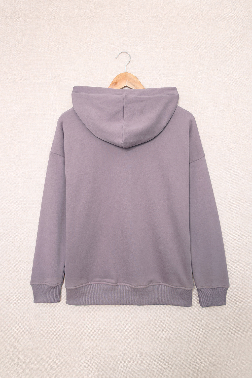 Green Snap Button Pullover Hoodie featuring a kangaroo pocket and drawstring hood, perfect for casual wear.