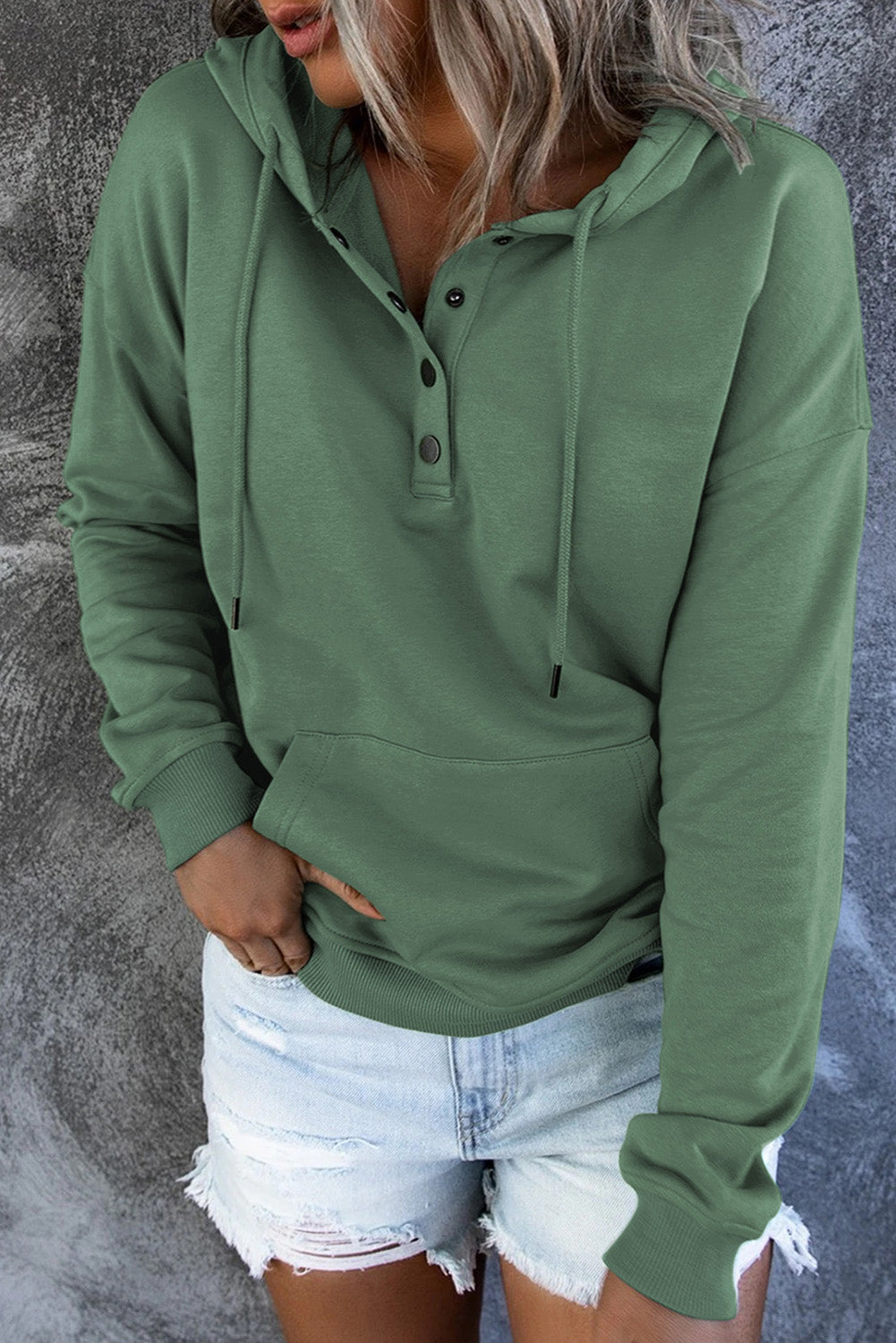 Green Snap Button Pullover Hoodie featuring a kangaroo pocket and drawstring hood, perfect for casual wear.