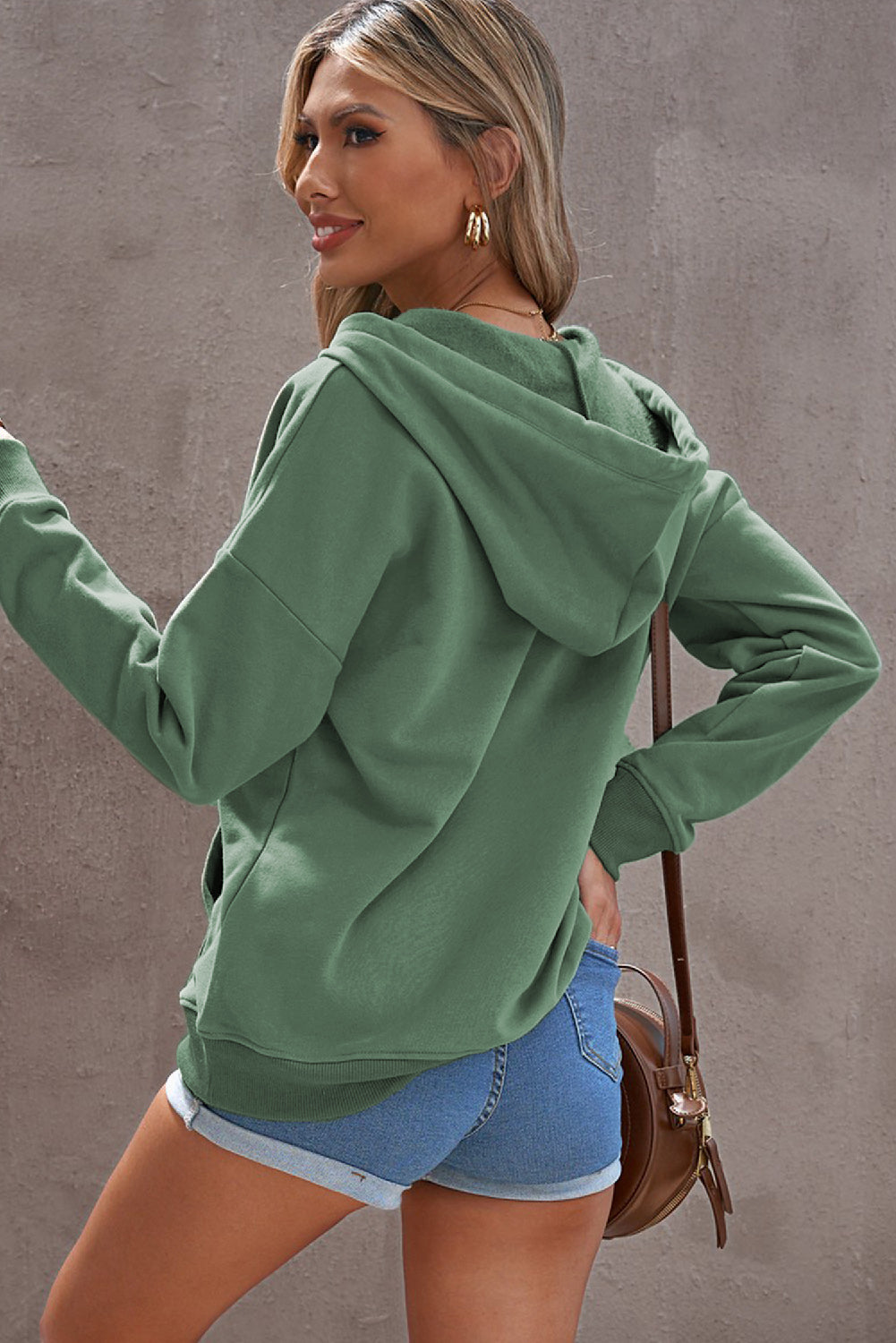 Green Snap Button Pullover Hoodie featuring a kangaroo pocket and drawstring hood, perfect for casual wear.