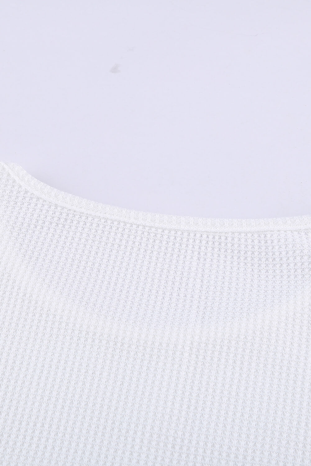 A stylish green top featuring colorblock and striped splicing design, perfect for casual wear.