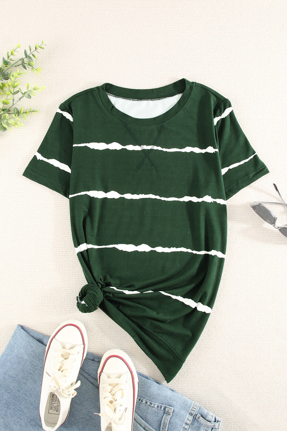 Green Tie-dye Stripe Casual T-Shirt displayed on a mannequin, showcasing its stylish design and soft fabric.