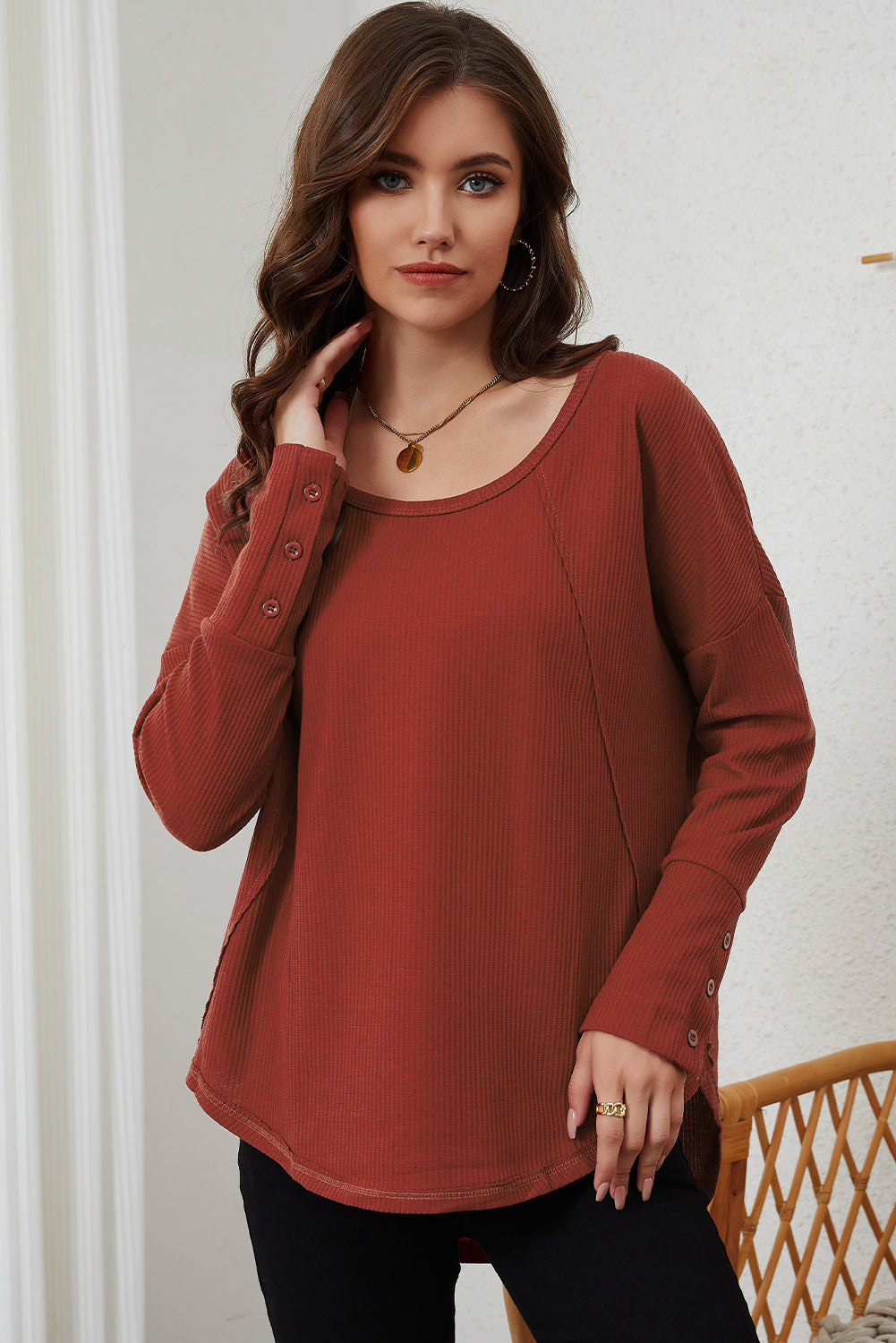A stylish green waffle knit long sleeve top featuring splicing buttons and a crew neckline, perfect for casual wear.