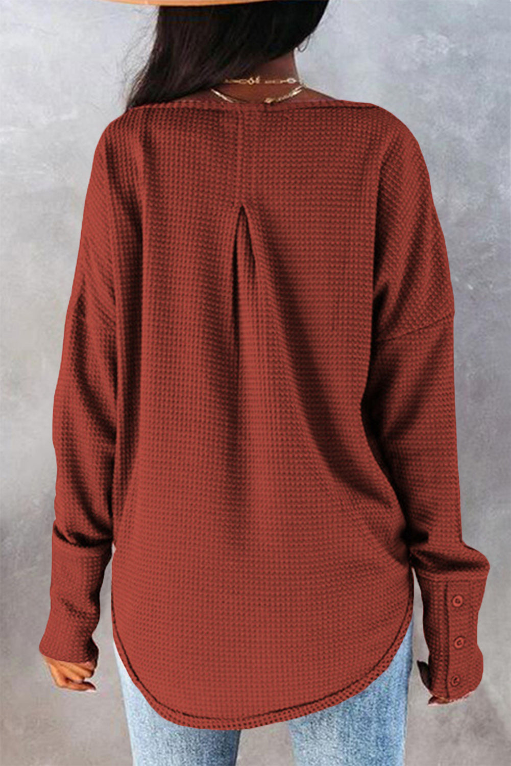 A stylish green waffle knit long sleeve top featuring splicing buttons and a crew neckline, perfect for casual wear.