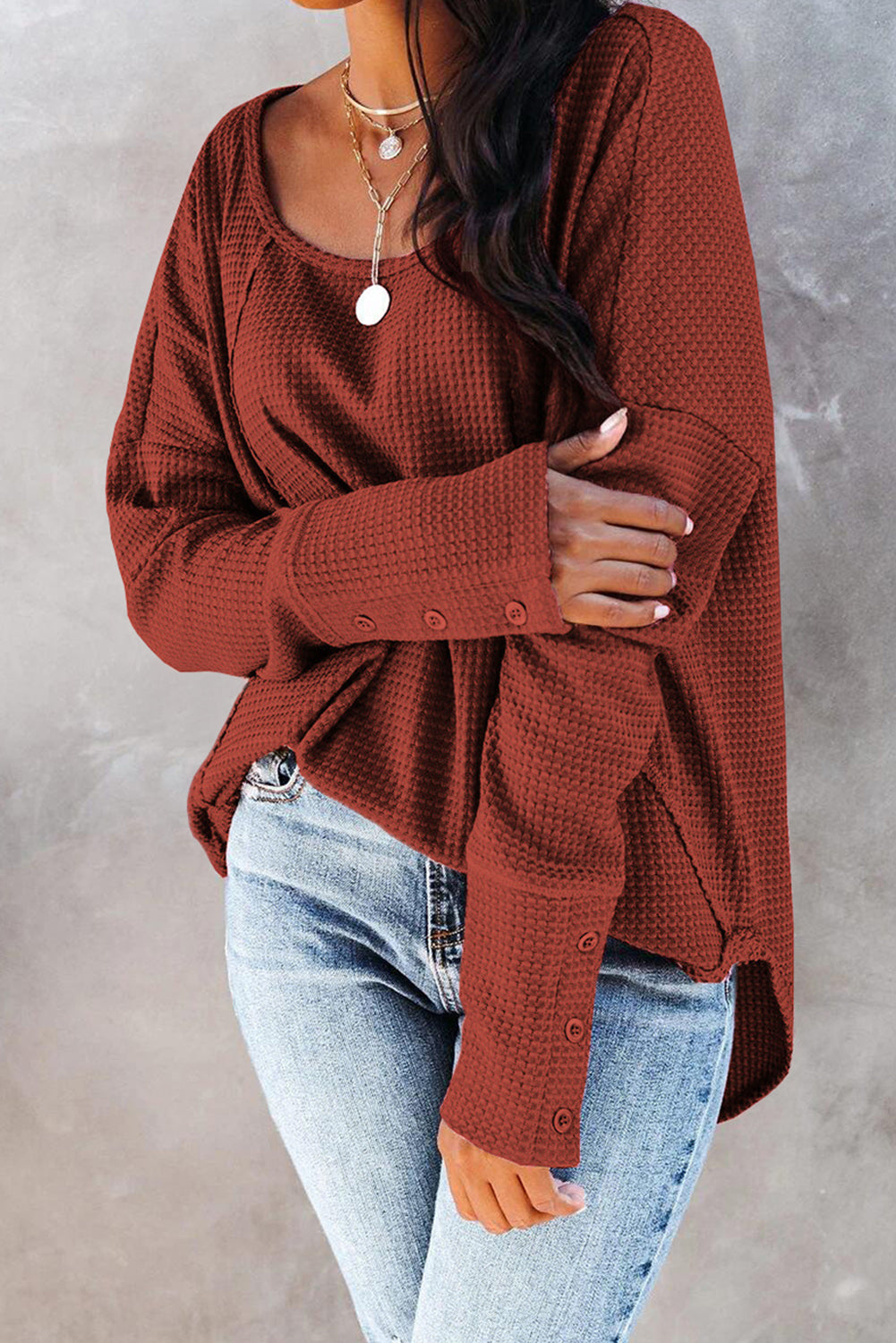 A stylish green waffle knit long sleeve top featuring splicing buttons and a crew neckline, perfect for casual wear.