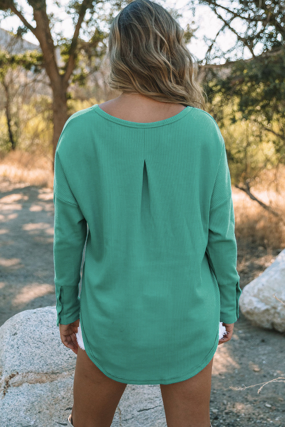 A stylish green waffle knit long sleeve top featuring splicing buttons and a crew neckline, perfect for casual wear.