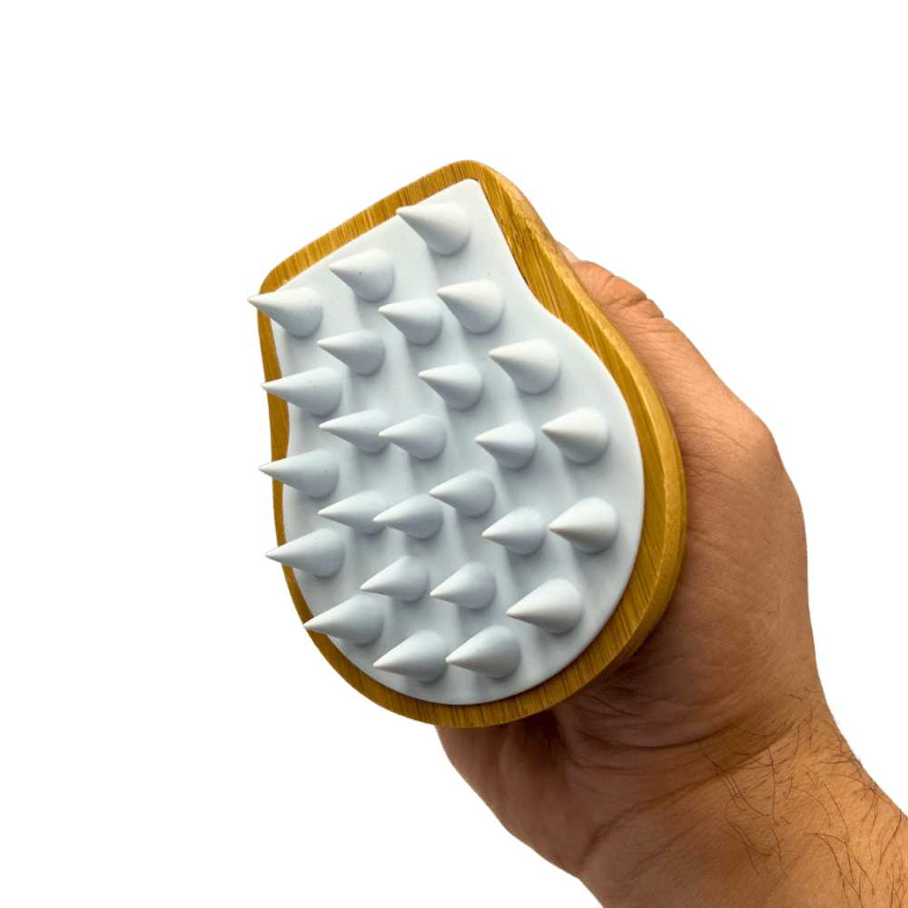 Hair and Scalp Massaging Brush made of natural wood and silicone, featuring a comfortable ergonomic handle and soft bristles for effective scalp massage.