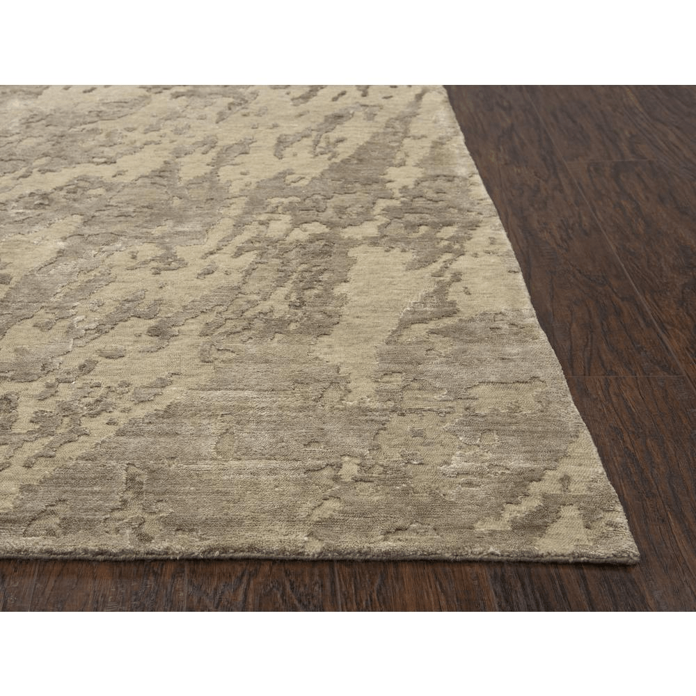 Hand knotted cut pile wool and viscose rug in beige and ivory abstract design, measuring 10' x 14', showcasing craftsmanship and quality.