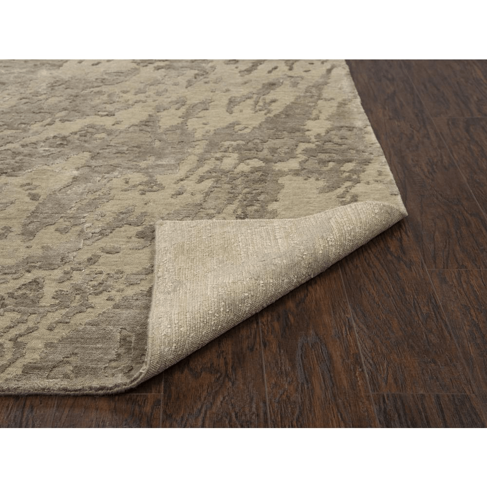 Hand knotted cut pile wool and viscose rug in beige and ivory abstract design, measuring 8' x 10', showcasing craftsmanship and quality.