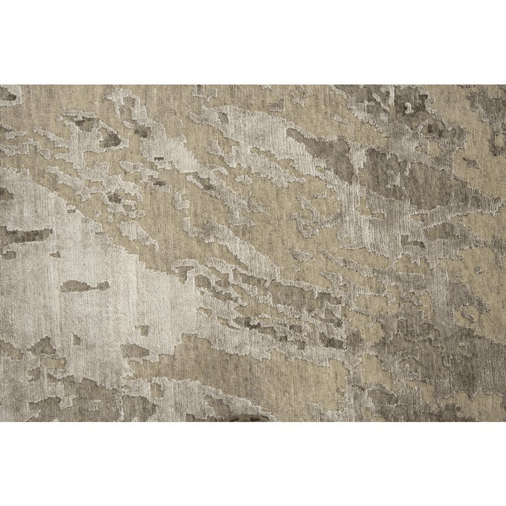 Hand knotted cut pile wool and viscose rug in beige and ivory abstract design, measuring 8' x 10', showcasing craftsmanship and quality.