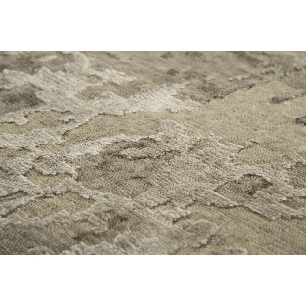 Hand knotted cut pile wool and viscose rug in beige and ivory abstract design, measuring 8' x 10', showcasing craftsmanship and quality.
