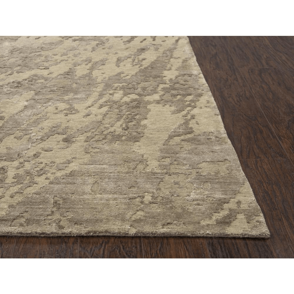 Hand knotted cut pile wool and viscose rug in beige and ivory abstract design, measuring 8' x 10', showcasing craftsmanship and quality.