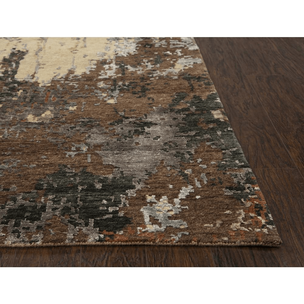 Hand knotted cut pile wool and viscose rug in rich earth tones, measuring 8' x 10', showcasing intricate textures and patterns.