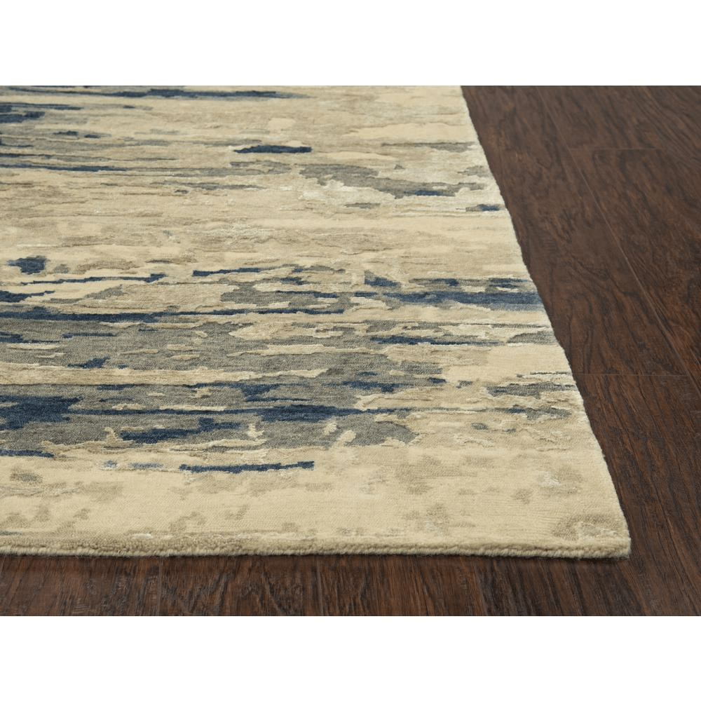 Hand Knotted Cut Pile Wool/Viscose Rug in blues and greys on a beige background, measuring 9' x 12', showcasing intricate artisan craftsmanship.
