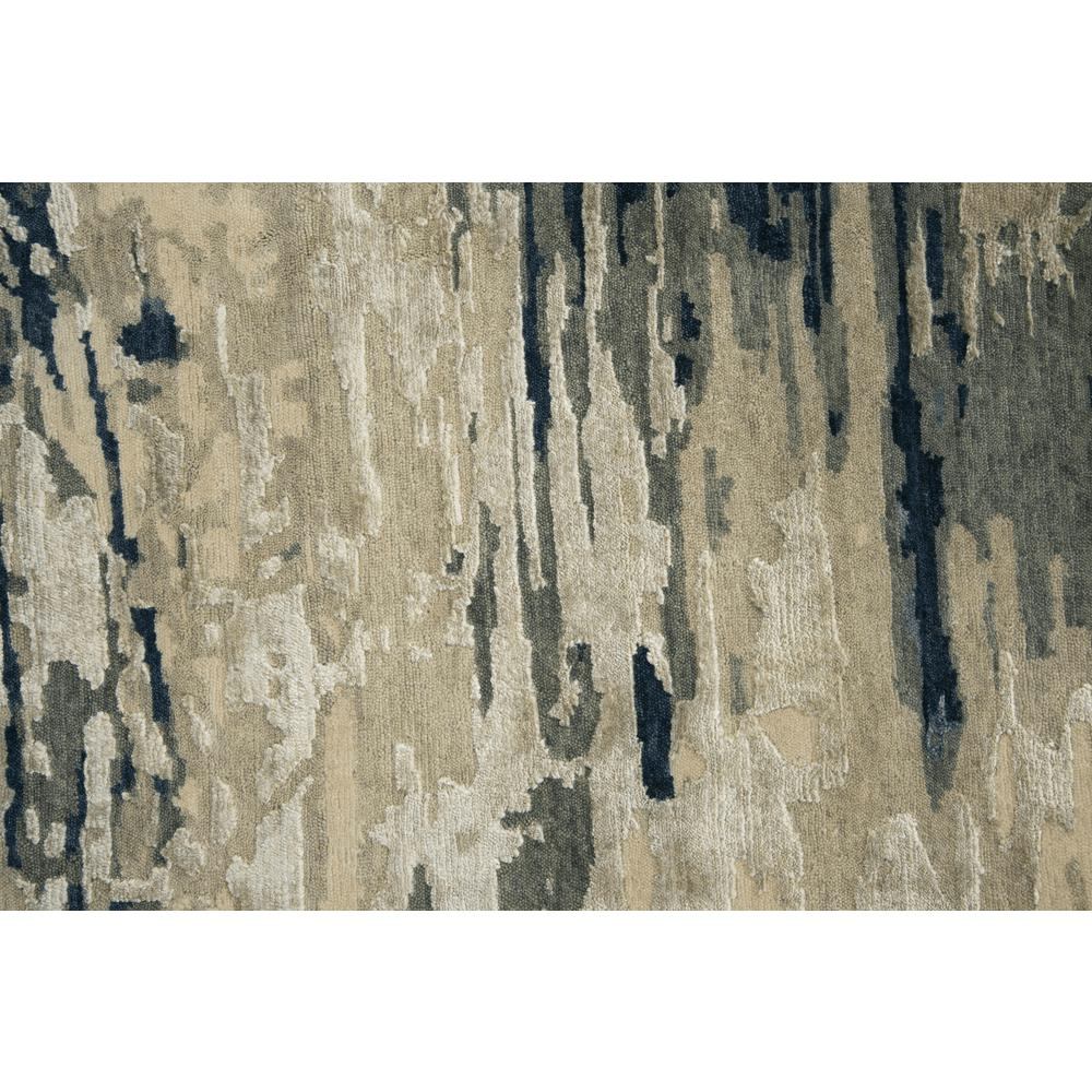 Hand Knotted Cut Pile Wool/Viscose Rug in blues and greys on a beige background, measuring 9' x 12', showcasing intricate artisan craftsmanship.