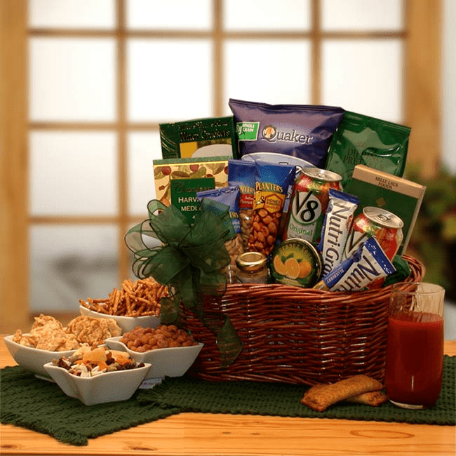 Heart Healthy Gourmet Gift Basket filled with nutritious snacks, beautifully arranged in a wicker basket with a green bow.
