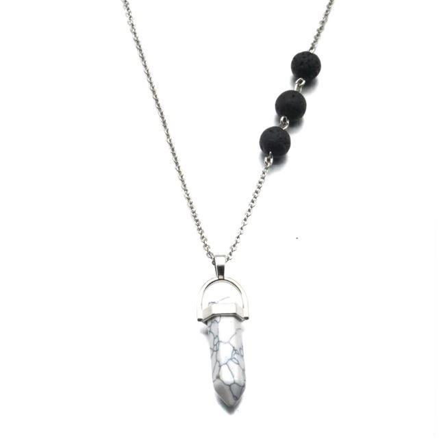 Howlite White Crystal Lava Stone Necklace with essential oils, showcasing its elegant design and porous lava stones.