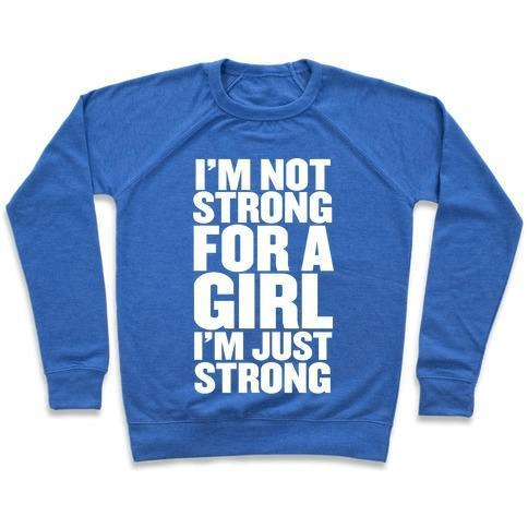 A stylish unisex crewneck sweatshirt featuring the phrase 'I'M NOT STRONG FOR A GIRL, I'M JUST STRONG' printed on the front, made from soft french terry fabric.