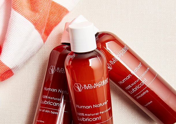 A 4 oz bottle of Intimate Lubricant designed for all skin types, featuring a sleek and modern design with a natural gel formula.