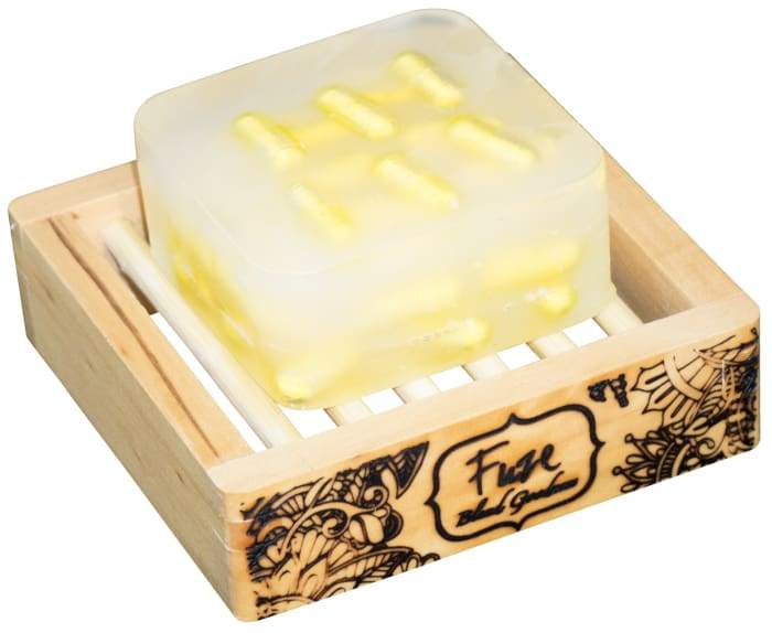 Handmade soap on wooden holder