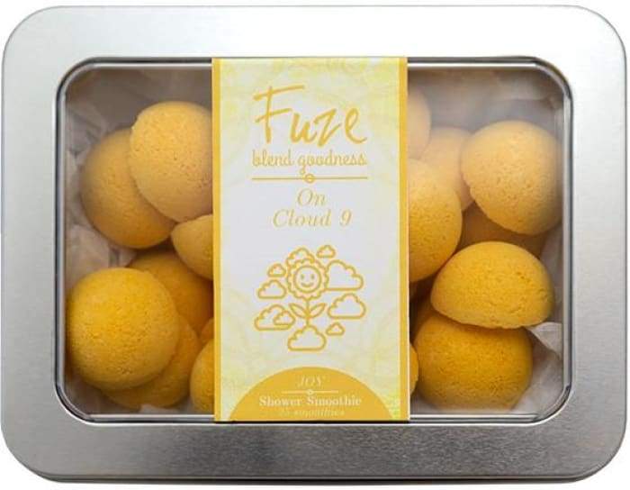 Joy Shower Smoothies 25 Pack featuring colorful essential oil-infused shower smoothies in a loofah bag.