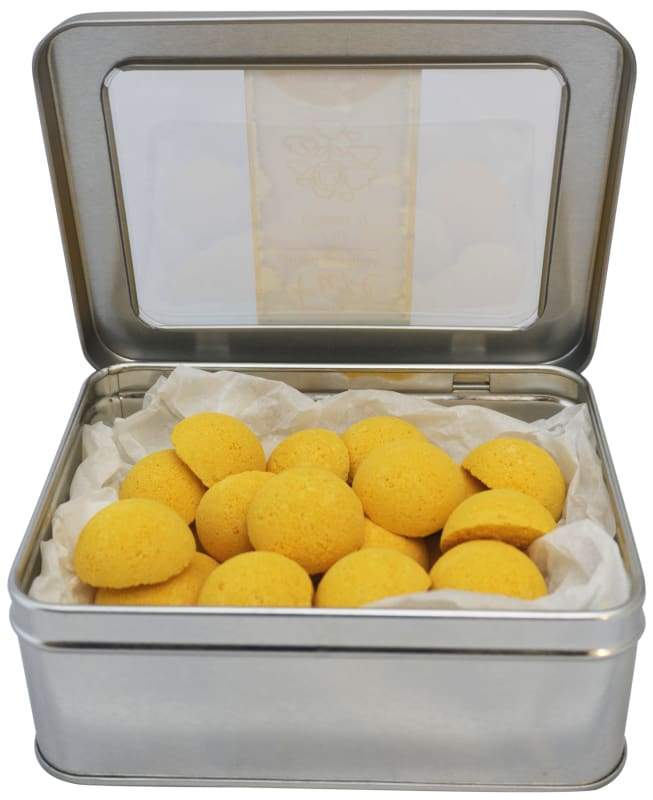 Joy Shower Smoothies 25 Pack featuring colorful essential oil-infused shower smoothies in a loofah bag.