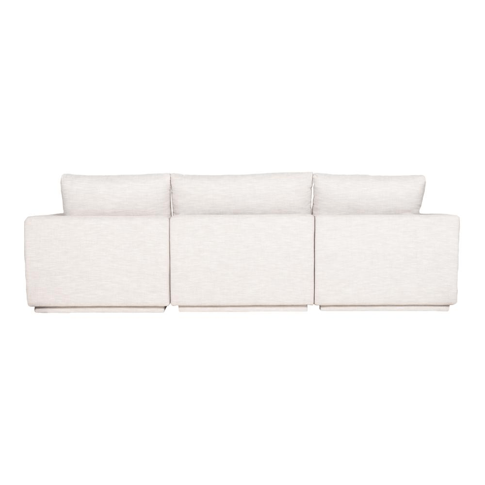 Justin Classic L Modular Sectional in a modern living room setting, featuring soft linen-blend upholstery and high-density foam seating.