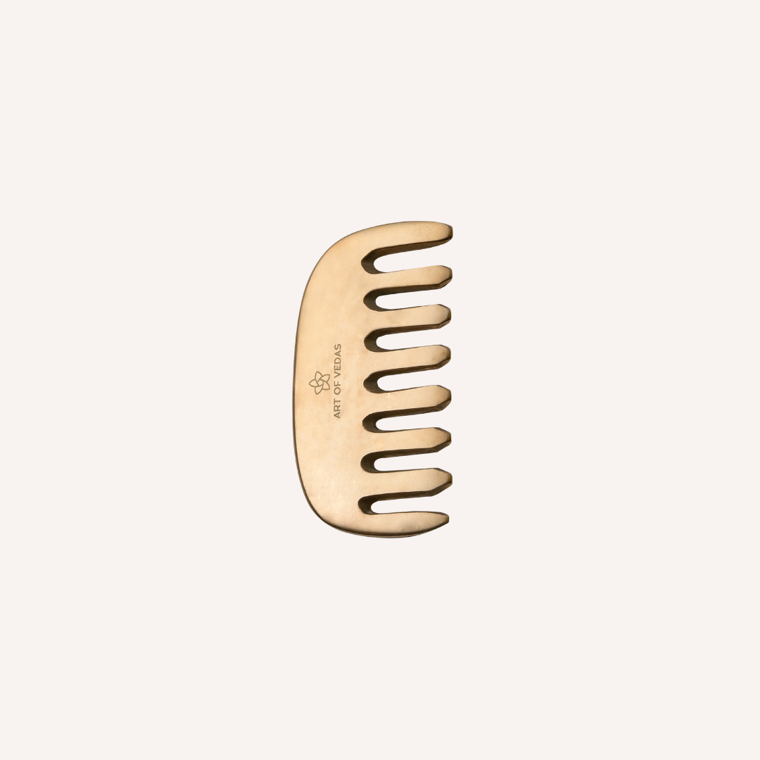 A beautifully crafted Kansa Comb made from Kansa metal, designed for holistic scalp health and revitalizing hair care.