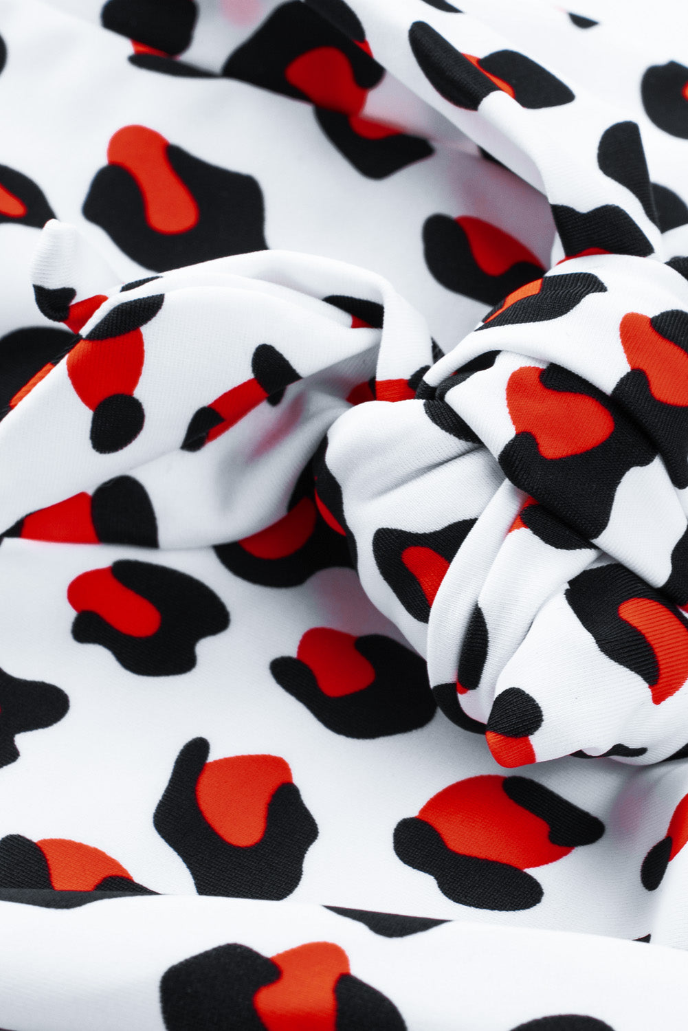 Khaki Halter V Neck Leopard High Waisted Swimsuit displayed on a mannequin, showcasing its stylish design and flattering fit.