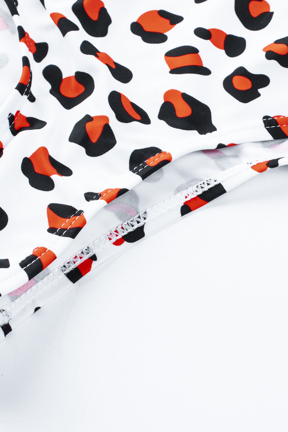 Khaki Halter V Neck Leopard High Waisted Swimsuit displayed on a mannequin, showcasing its stylish design and flattering fit.