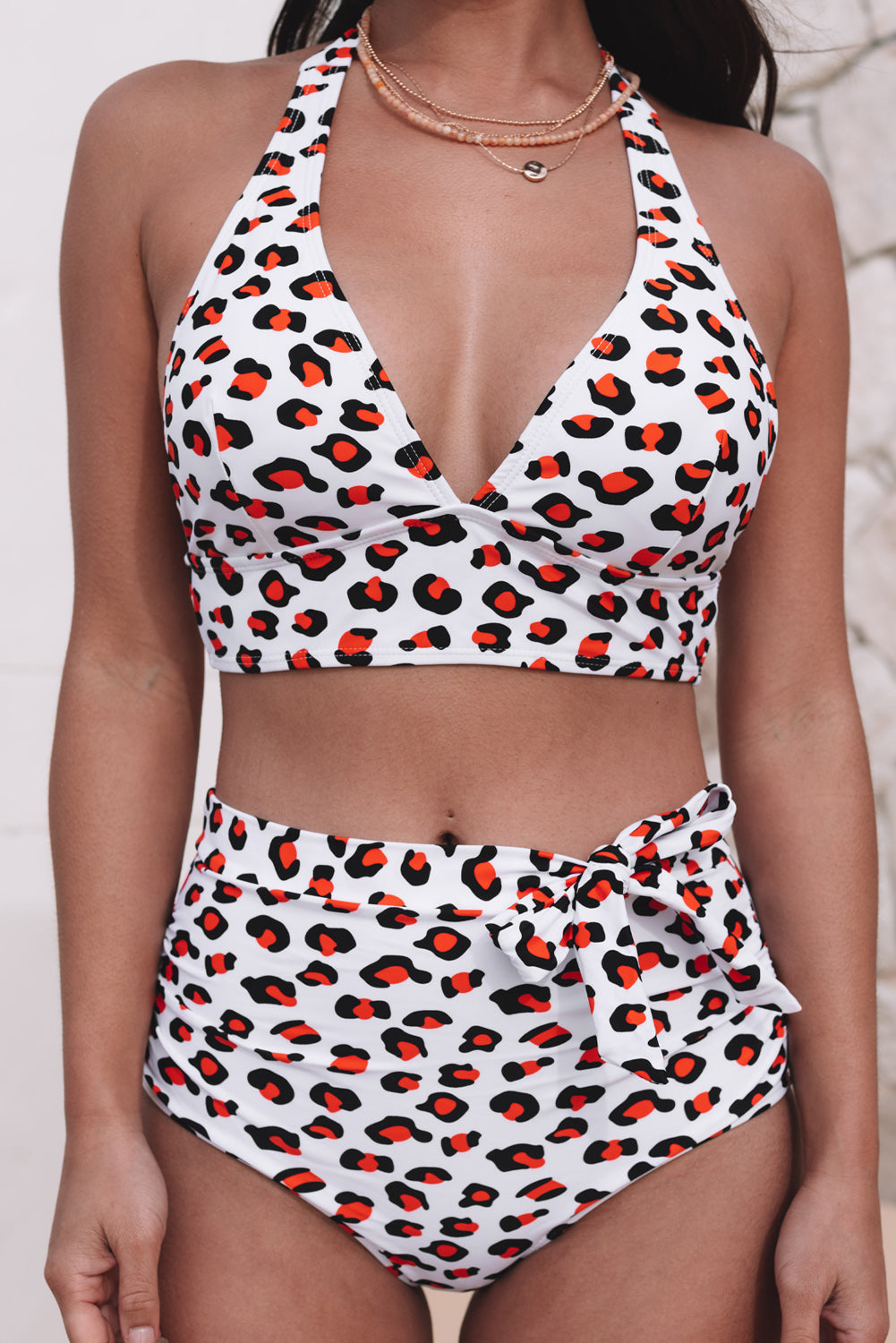 Khaki Halter V Neck Leopard High Waisted Swimsuit displayed on a mannequin, showcasing its stylish design and flattering fit.