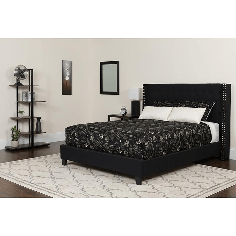 King Size Platform Bed in Black Fabric featuring a tufted headboard and pocket spring mattress, showcasing elegant nailhead trim.