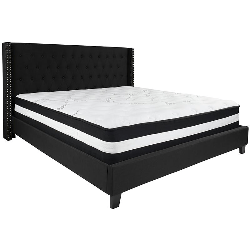 King Size Platform Bed in Black Fabric featuring a tufted headboard and pocket spring mattress, showcasing elegant nailhead trim.