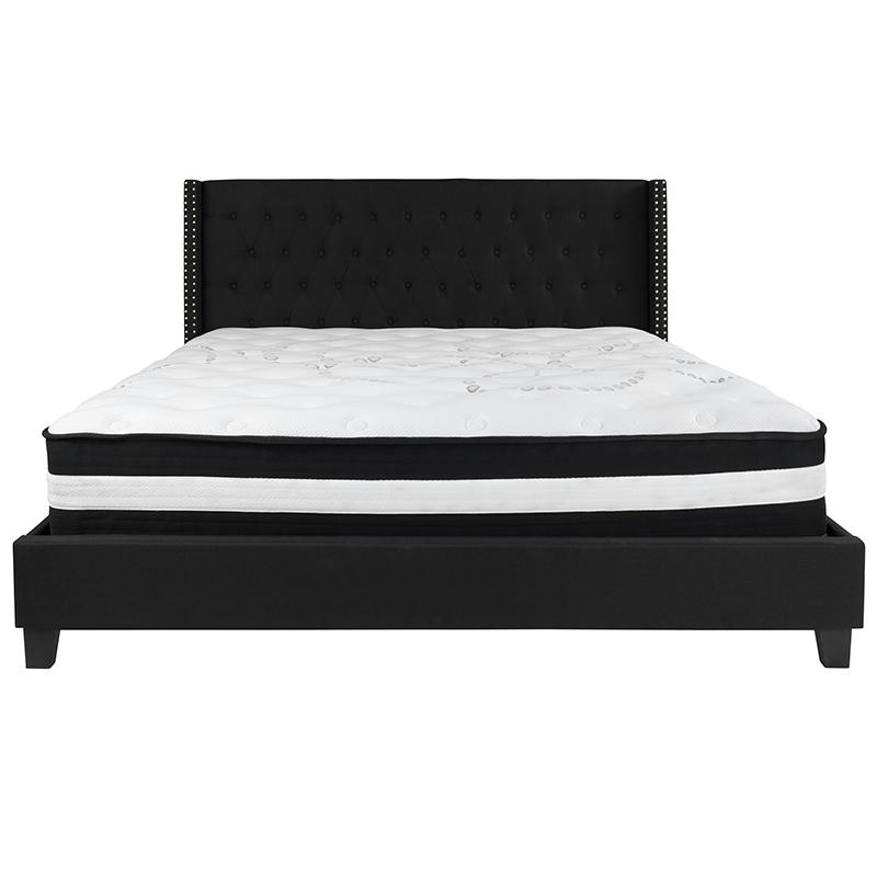King Size Platform Bed in Black Fabric featuring a tufted headboard and pocket spring mattress, showcasing elegant nailhead trim.