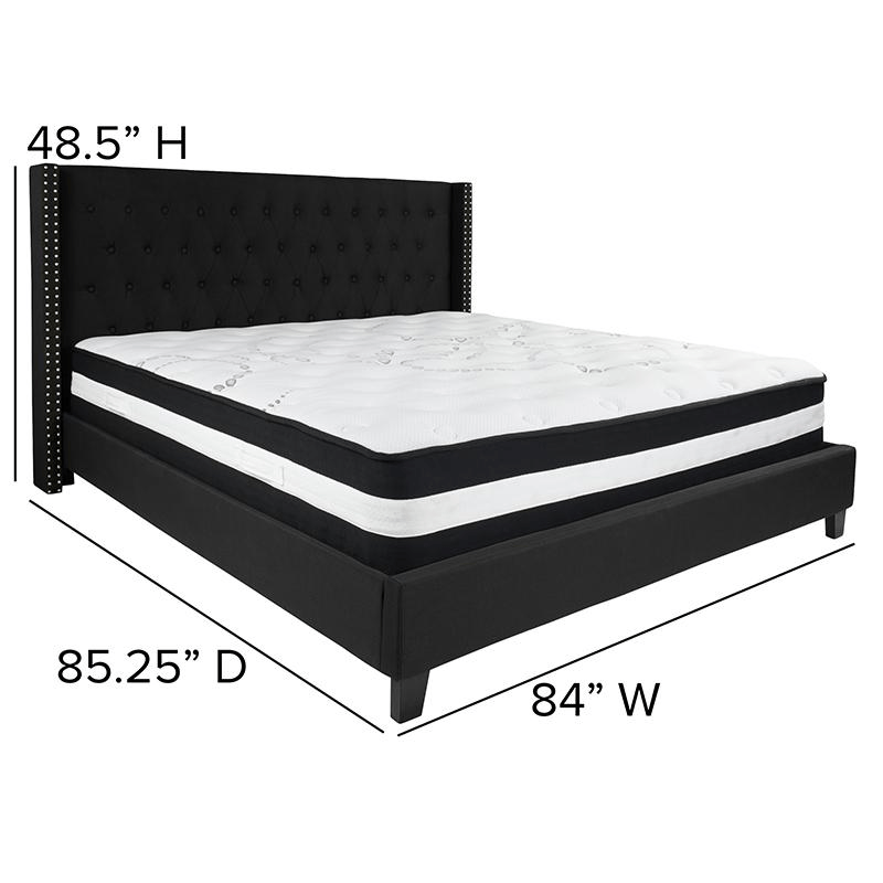 King Size Platform Bed in Black Fabric featuring a tufted headboard and pocket spring mattress, showcasing elegant nailhead trim.