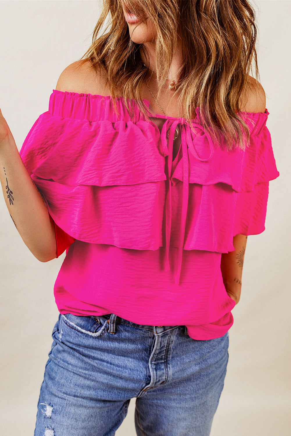 A stylish Lace Up Off Shoulder Ruffle Tiered Blouse featuring ruffles and a chic off-shoulder design, perfect for various occasions.