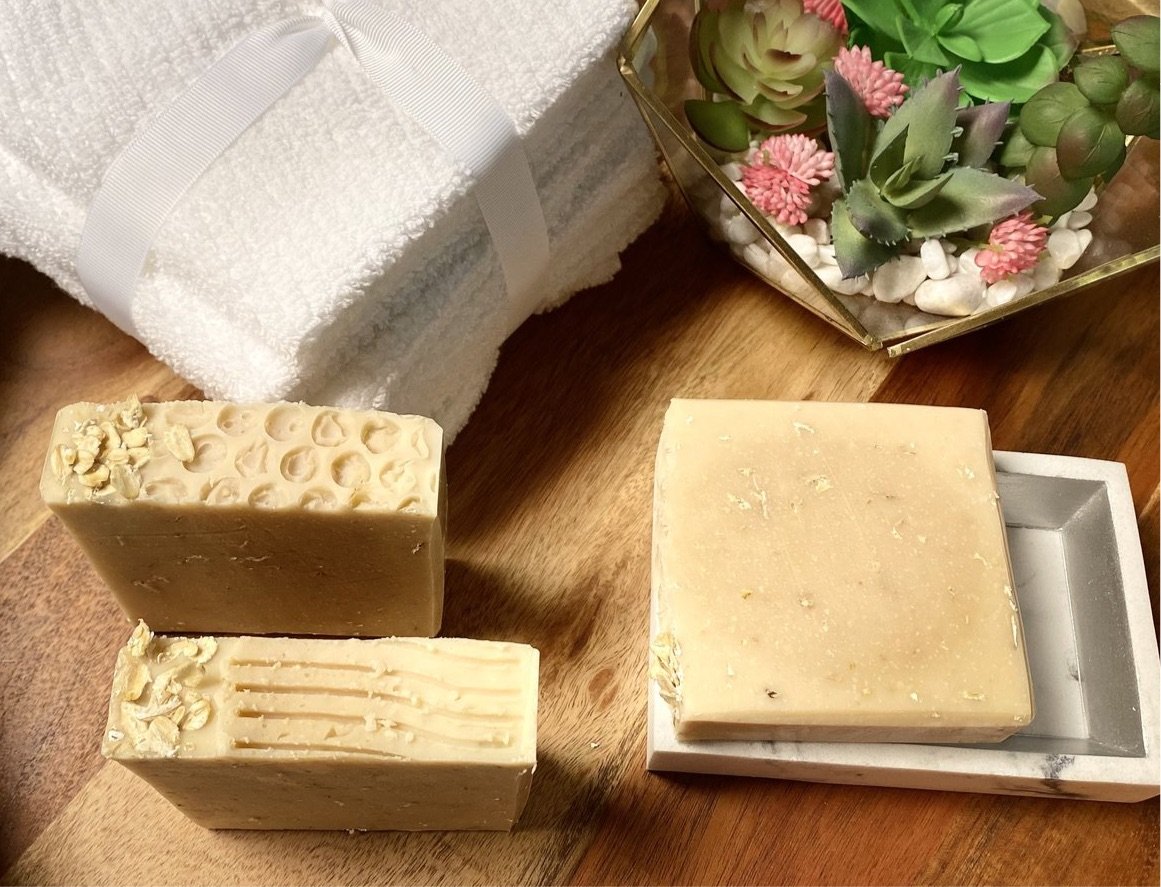 Large Goats Milk Oatmeal Soap bar with creamy texture and natural ingredients, perfect for sensitive skin care.