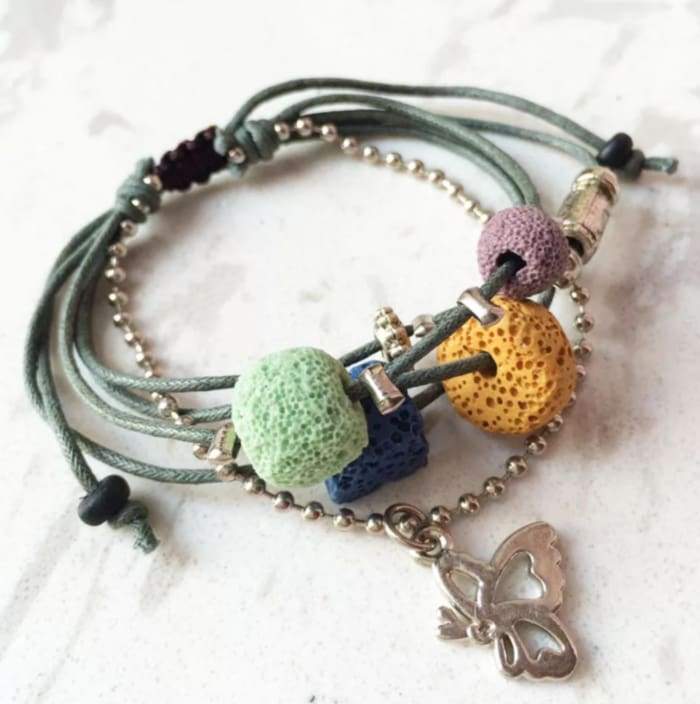 Green Lava Stone Essential Oil Bracelet with natural lava charms, perfect for aromatherapy.