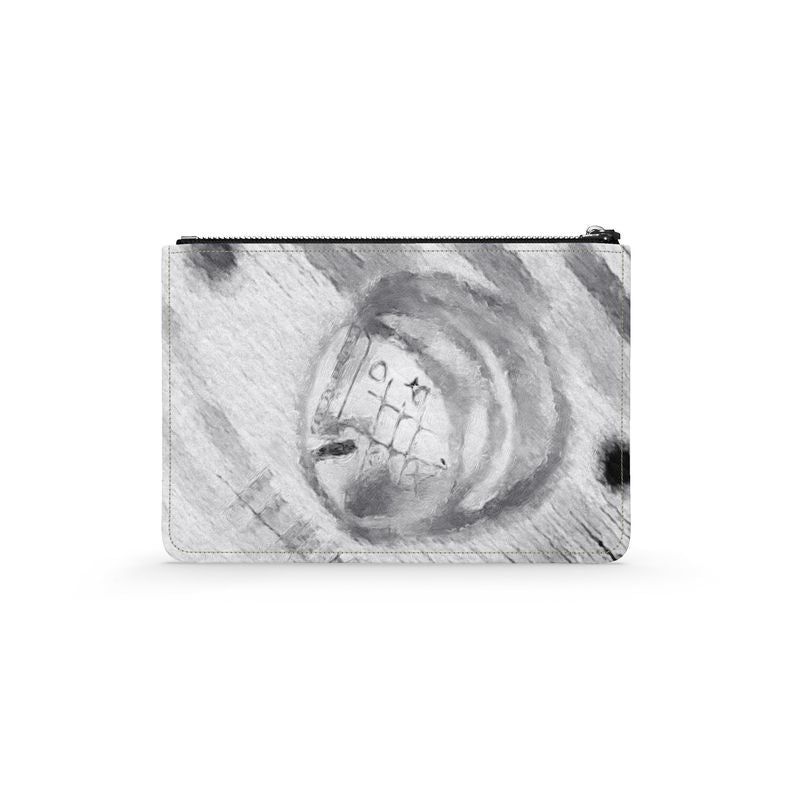 A stylish Designer Leather Pouch made from 100% real Nappa leather, featuring a faux suede inner-lining and eco-friendly ink design.