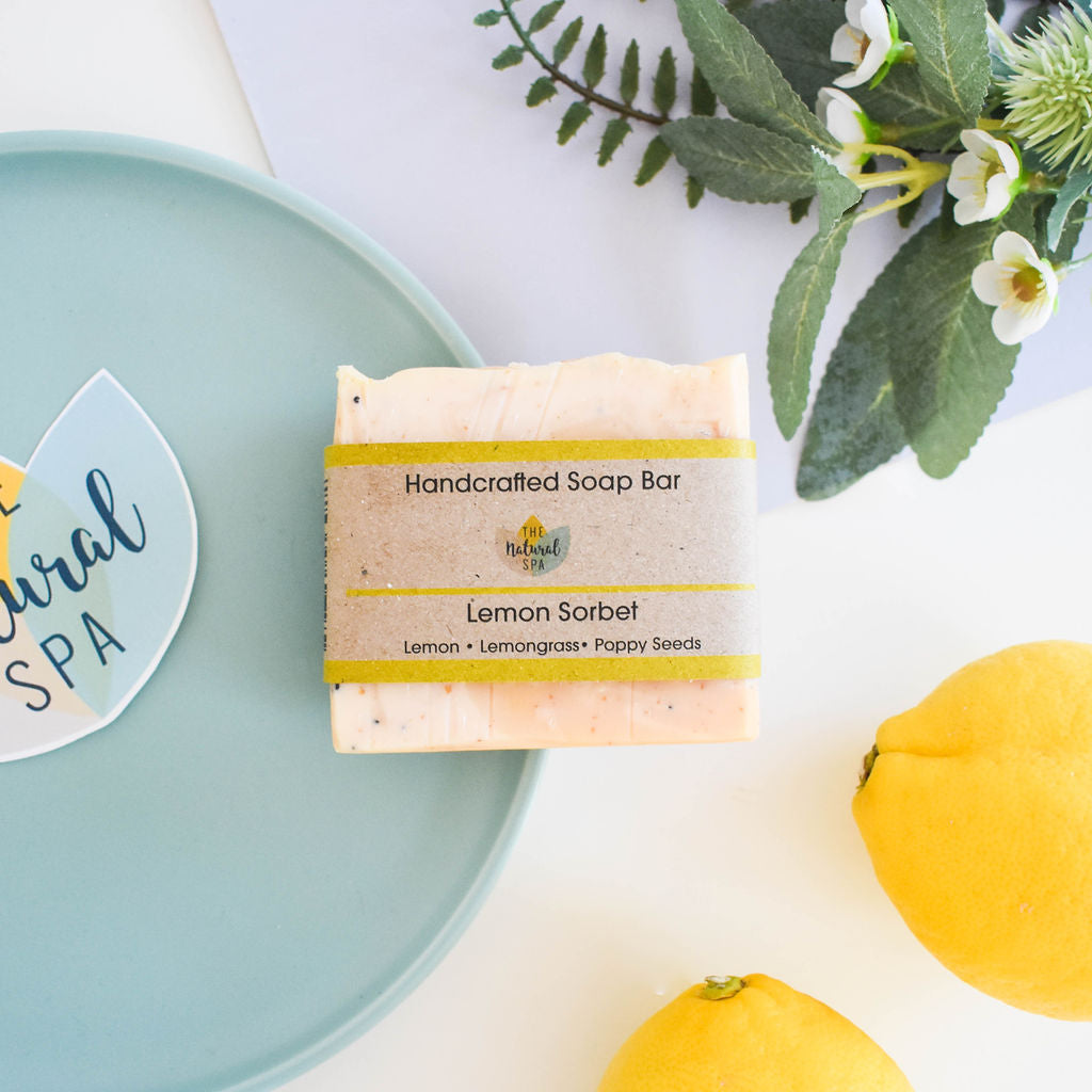 Lemon Sorbet Soap Bar featuring lemon, lemongrass, and poppy seeds, beautifully handcrafted with unique designs.