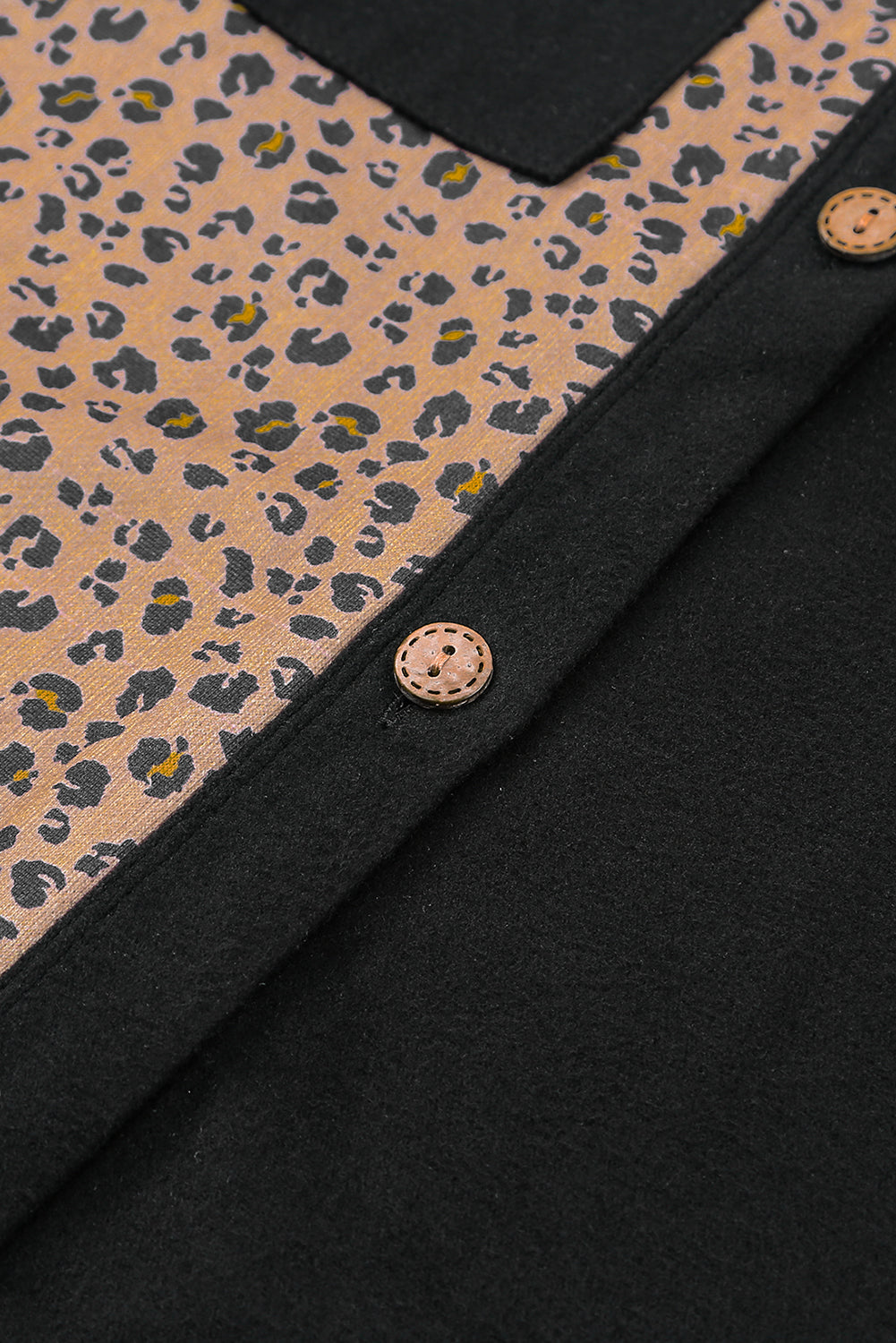 Leopard Patchwork Shacket Jacket featuring charcoal and brown leopard print with mustard accents, button-front closure, and oversized chest pockets.