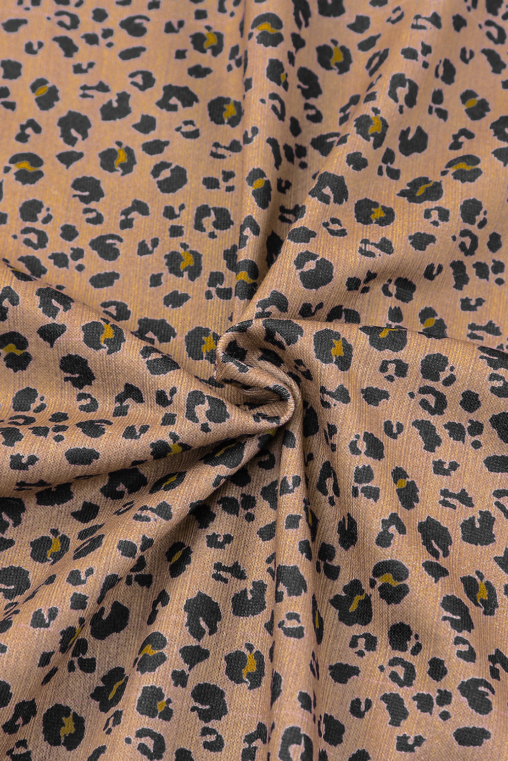 Leopard Patchwork Shacket Jacket featuring charcoal and brown leopard print with mustard accents, button-front closure, and oversized chest pockets.