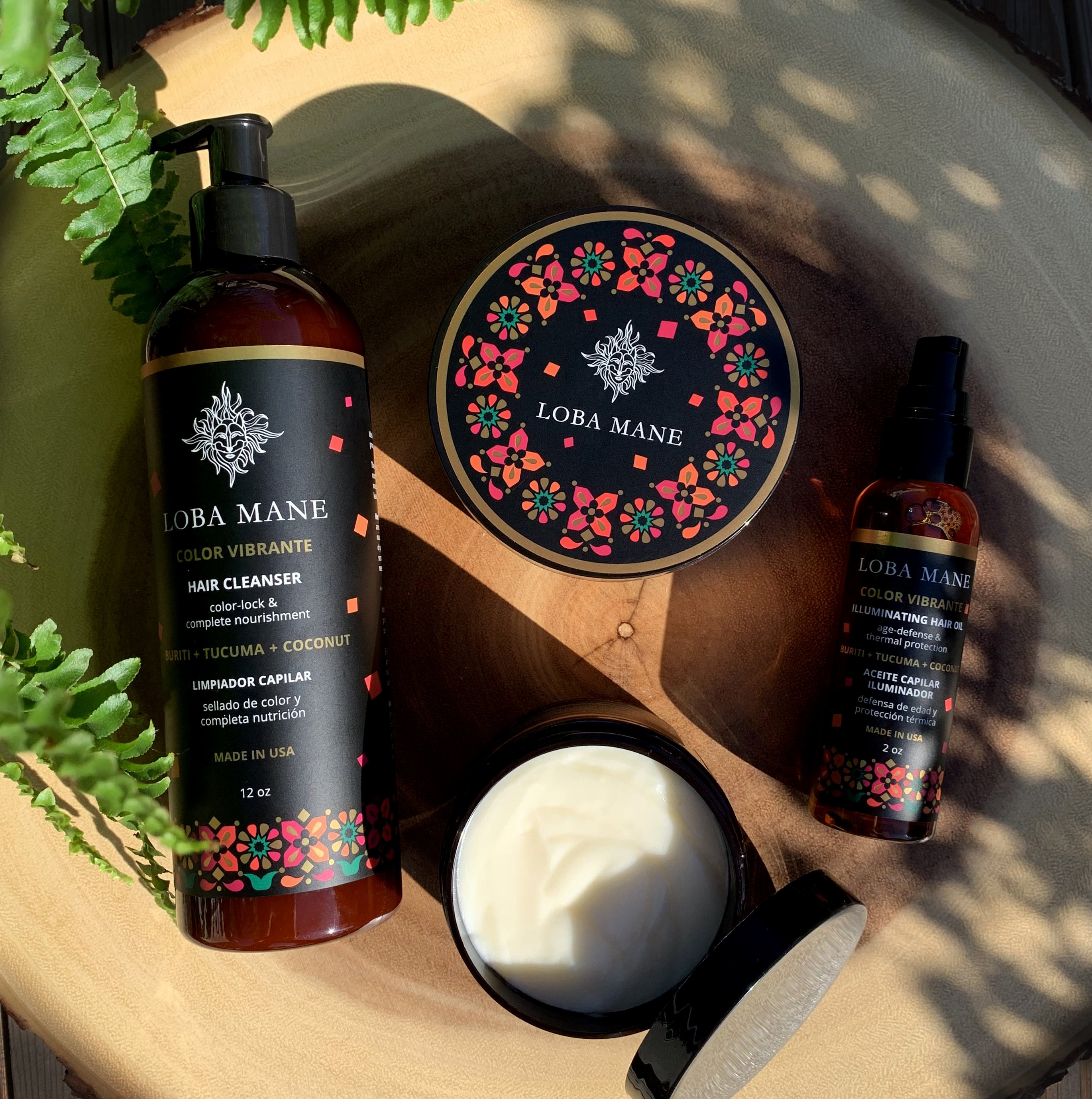 Loba Mane Color Vibrante Complete Set featuring hair cleanser, transformative mask, styling cream, and illuminating hair oil in elegant packaging.