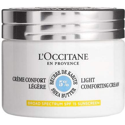 L'Occitane 5% Shea Light Comforting Face Cream SPF15 in a sleek jar, showcasing its creamy texture and SPF protection.