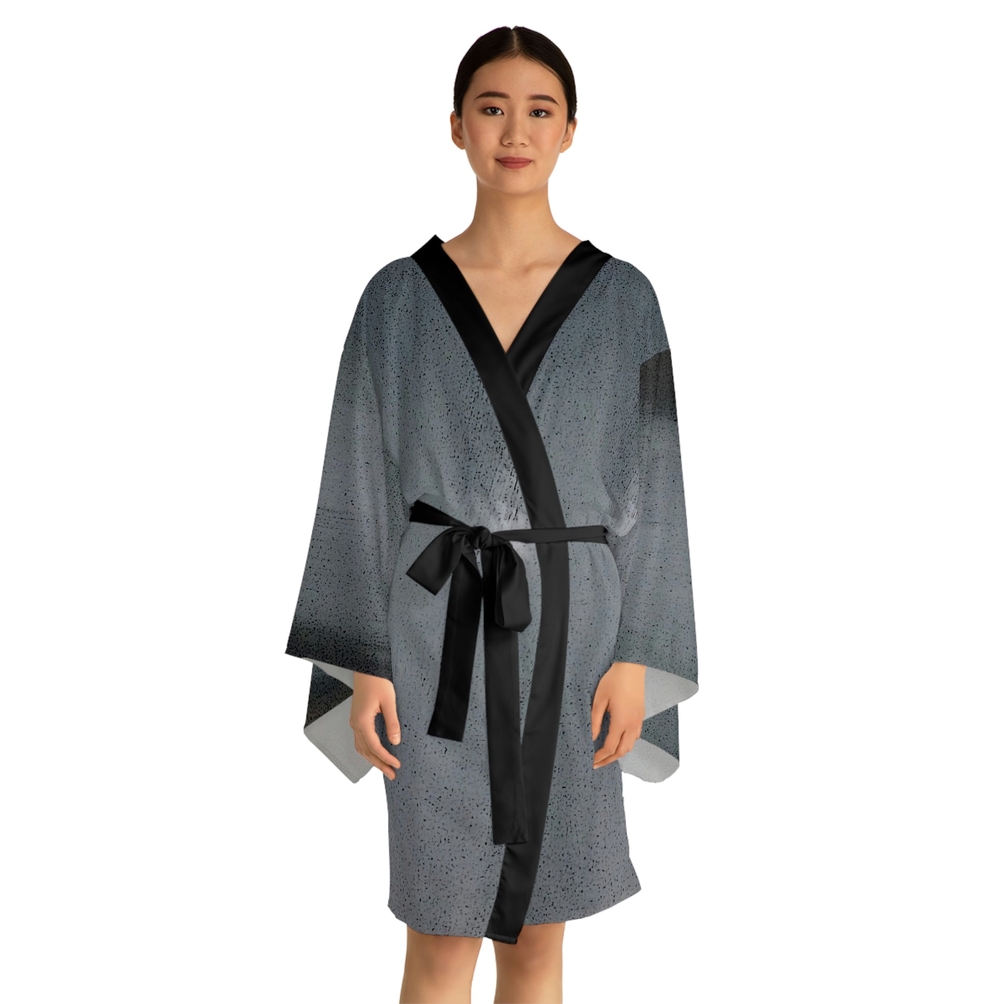 A stylish Long Sleeve Kimono Robe in black with flowing bell sleeves and a belt, showcasing its elegant design and smooth texture.