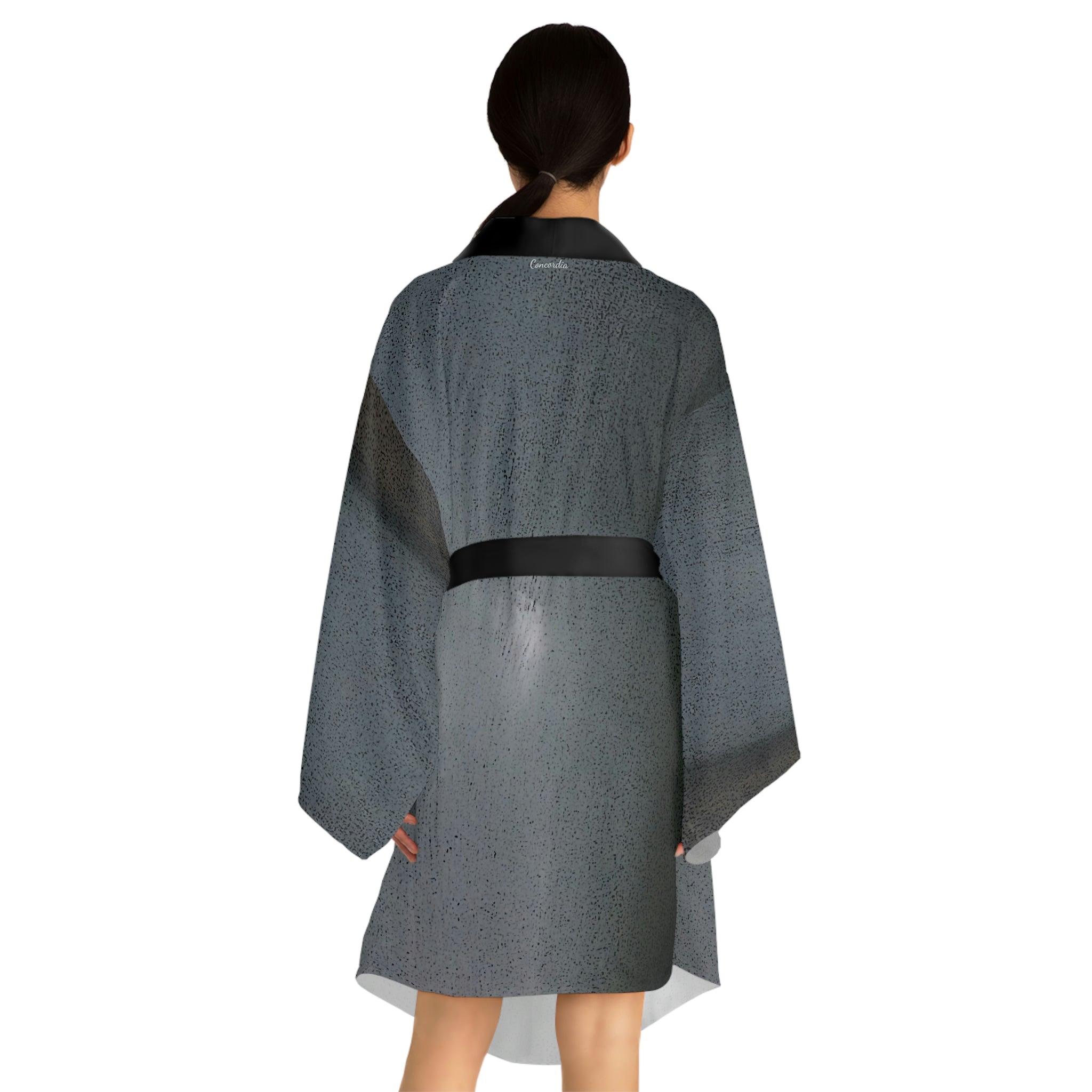 A stylish Long Sleeve Kimono Robe in black with flowing bell sleeves and a belt, showcasing its elegant design and smooth texture.