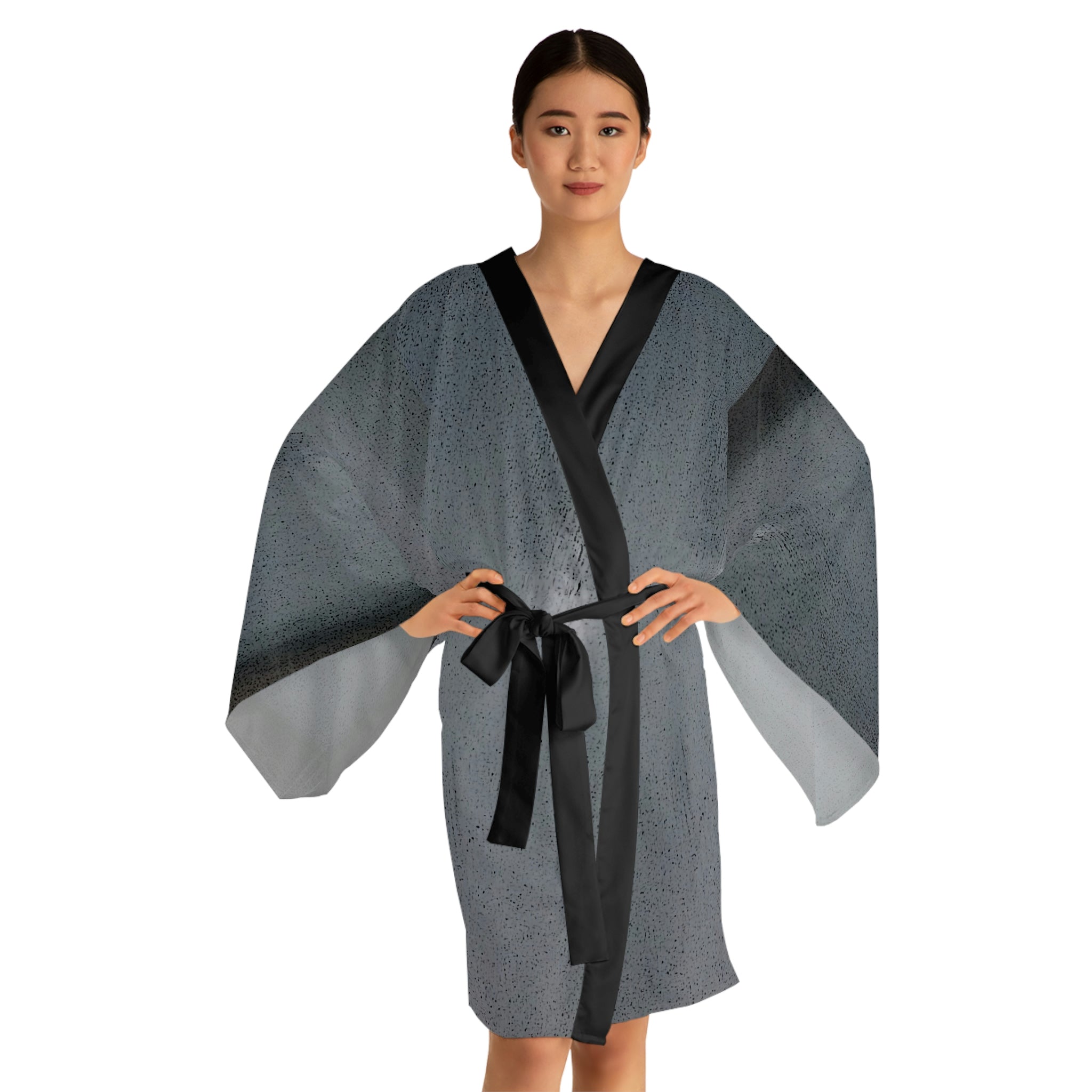 A stylish Long Sleeve Kimono Robe in black with flowing bell sleeves and a belt, showcasing its elegant design and smooth texture.